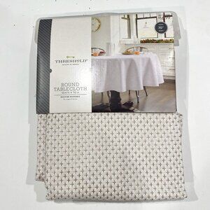 Threshold, NWT, 70" round gold and white tablecloth.